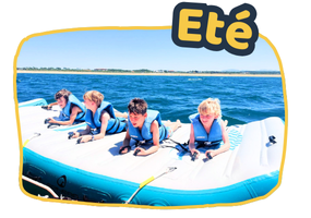 Supernova colonies de vacances enfant sur un wake board géant sur la mer méditerranée